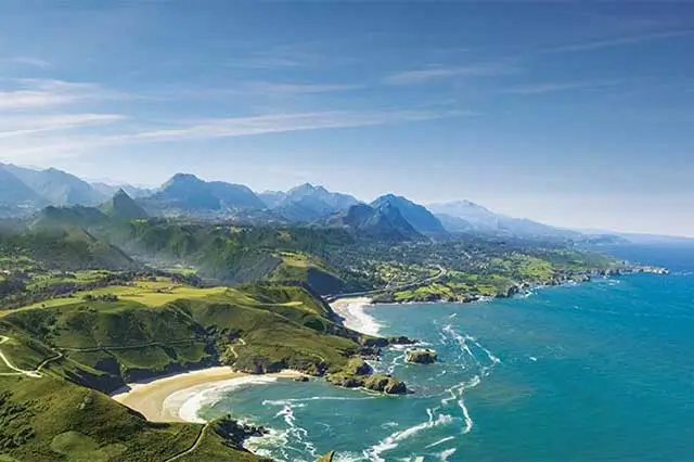 Stunning aerial view of Torimbia Beach and the surrounding Asturian coastline.