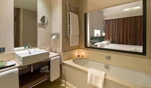 Elegant and modern bathroom in a 4-star hotel for summer camp coaches.